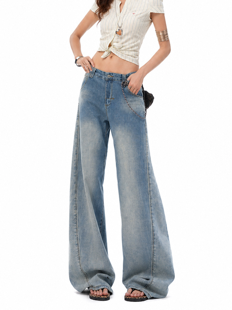 Vintage-wash curved-leg jeans—new, stylish, loose-fitting 
