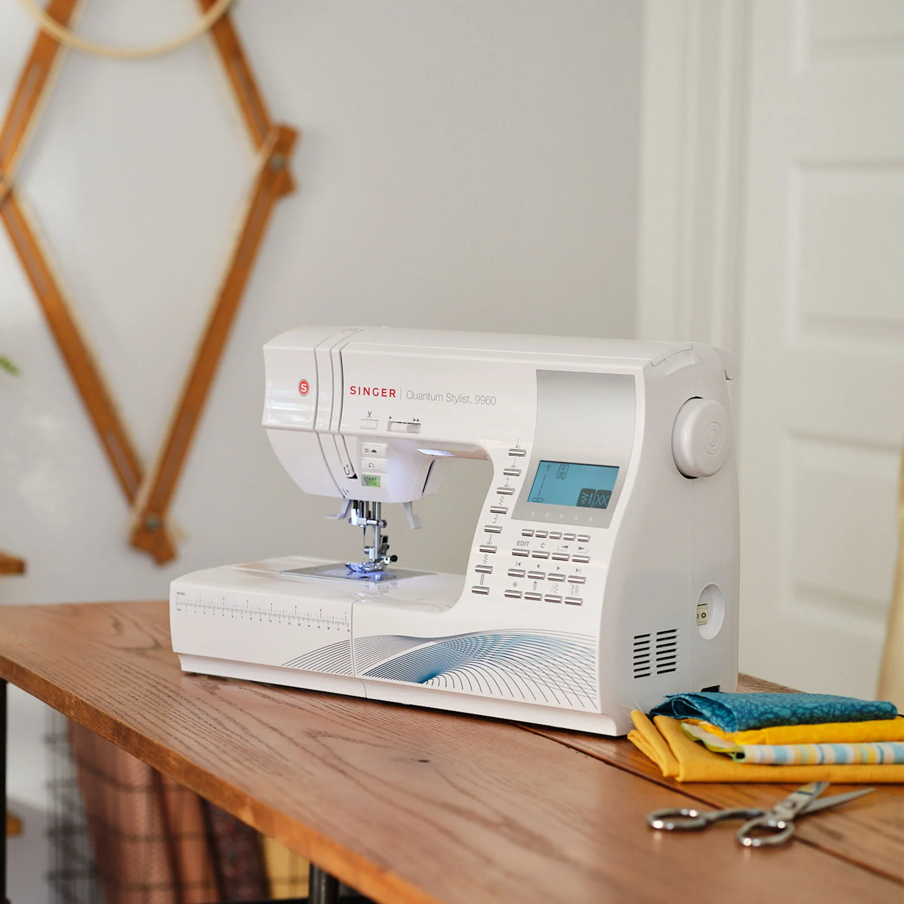 SINGER® Sew Spacious Quantum Stylist™ 9960 Sewing Machine & Presser Foot Kit Bundle