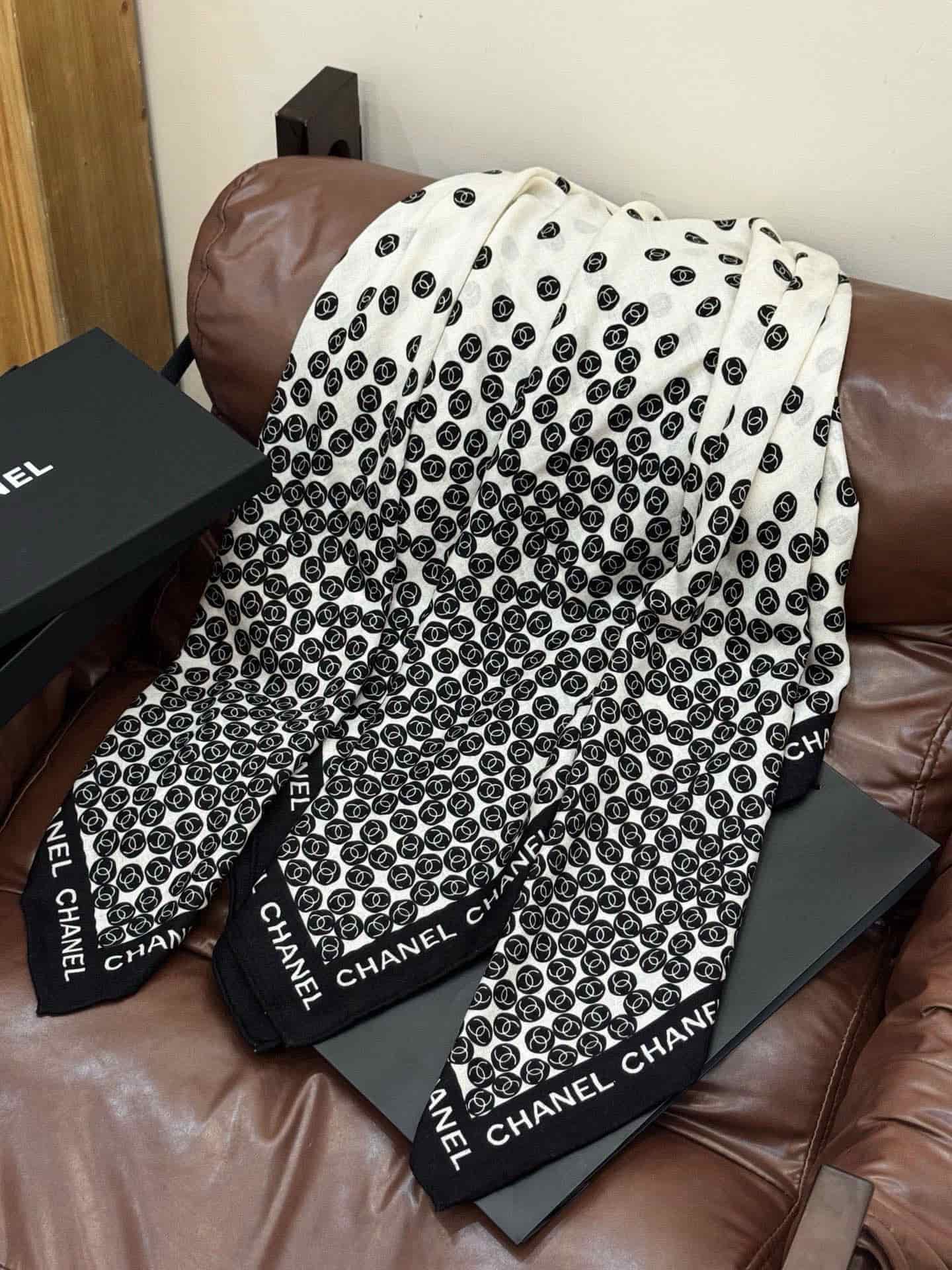 Chanel silk scarf featuring polka dot pattern