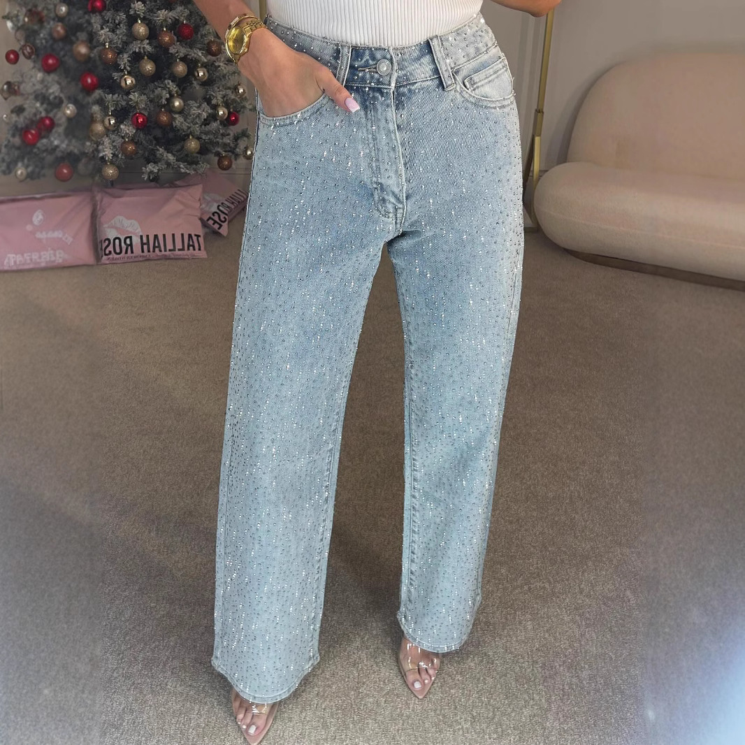 Women's high-waisted, straight-leg, acid-wash jeans featuring an all-over rhinestone design—a sexy style.