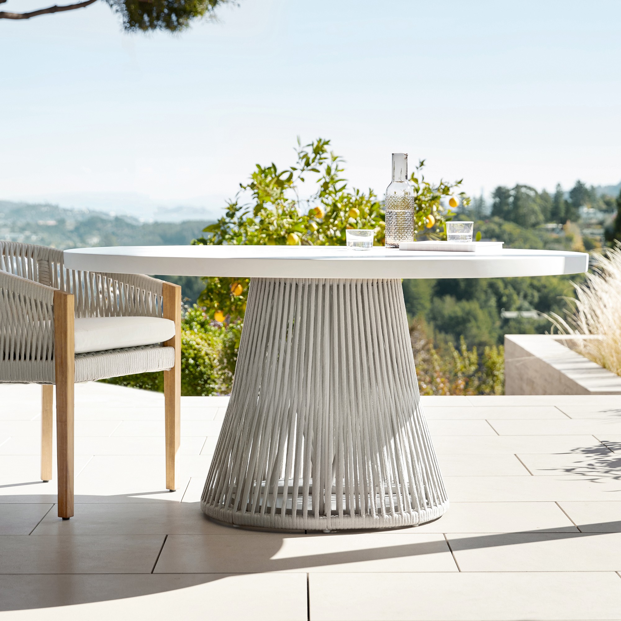 Pasadena Outdoor Fiberstone and Rope Round Dining Table & Pasadena Dining Chairs (60