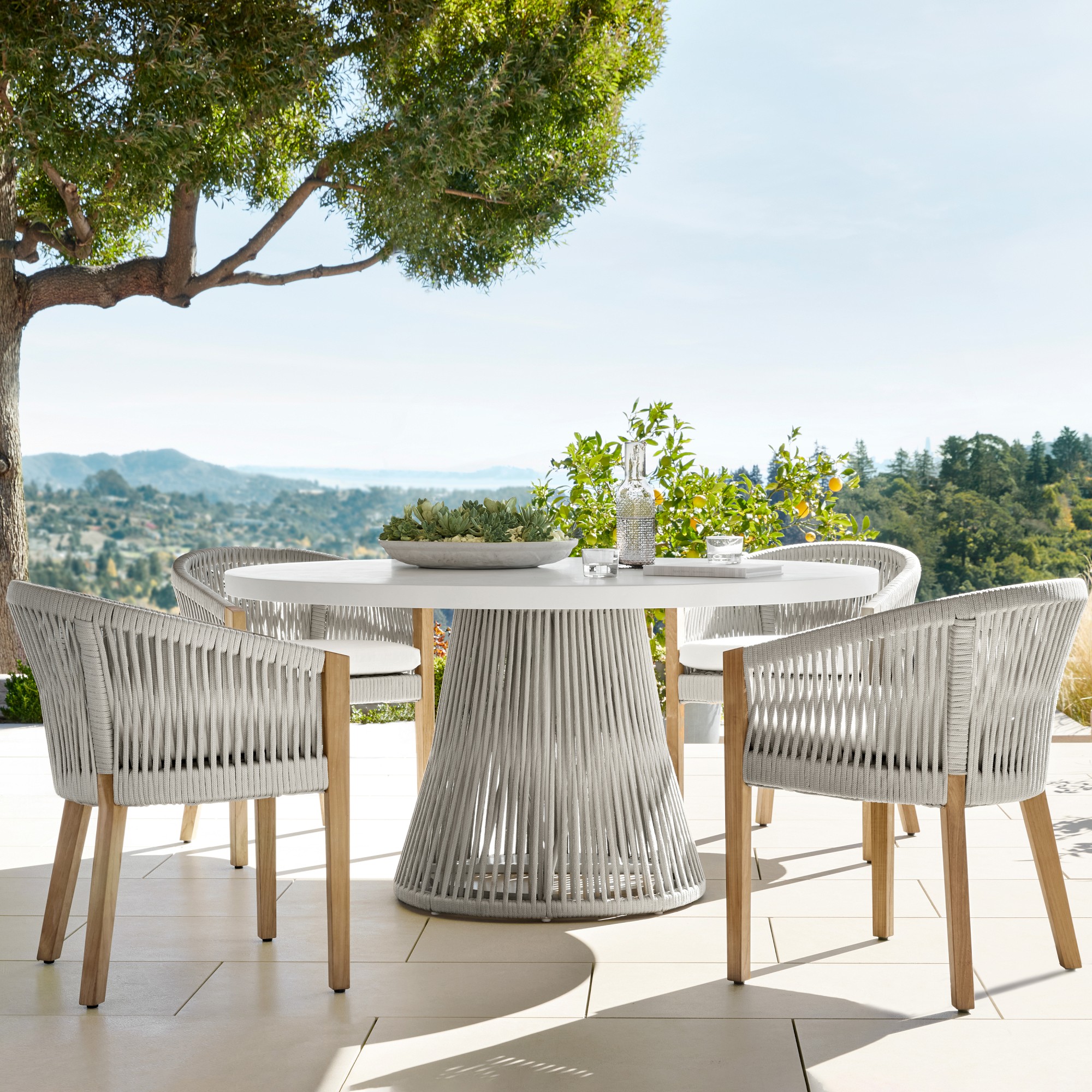 Pasadena Outdoor Fiberstone and Rope Round Dining Table & Pasadena Dining Chairs (60