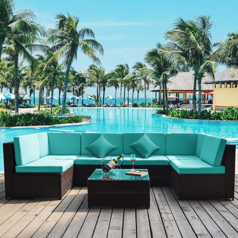 Haoyang 7 Piece Rattan Sectional Seating Group with Cushions