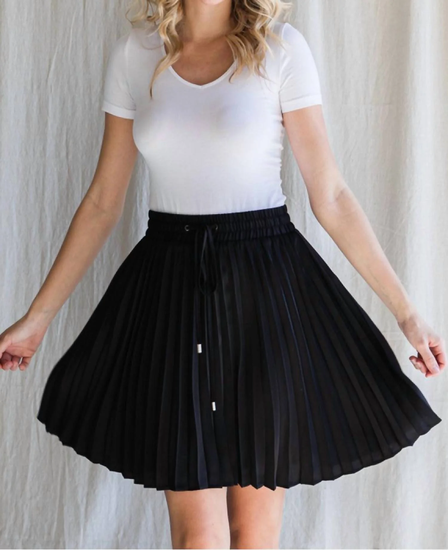 Just A Flirt Pleated Skirt In Black