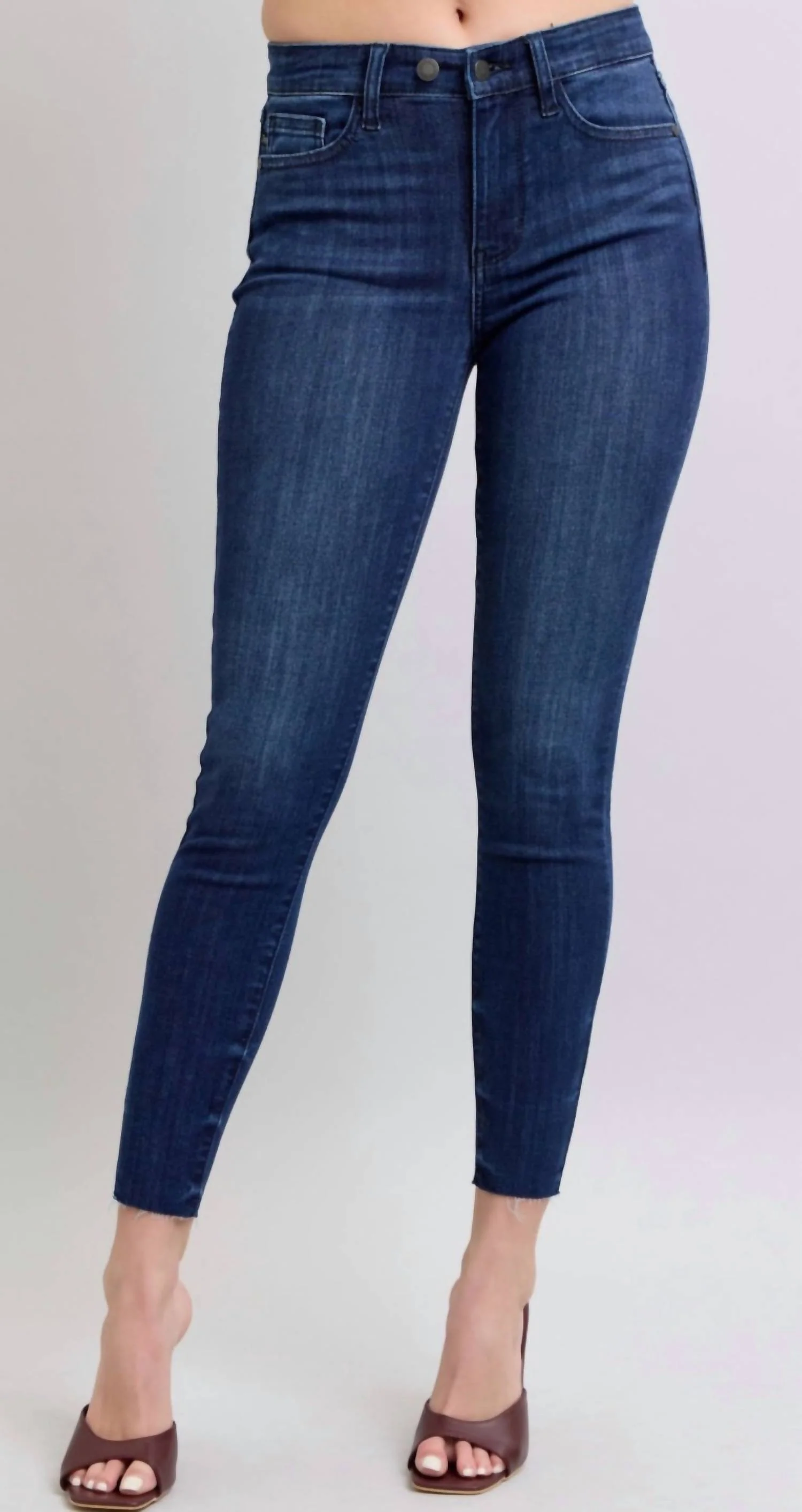 Mid Rise Raw Hem Skinny Jeans In Blue