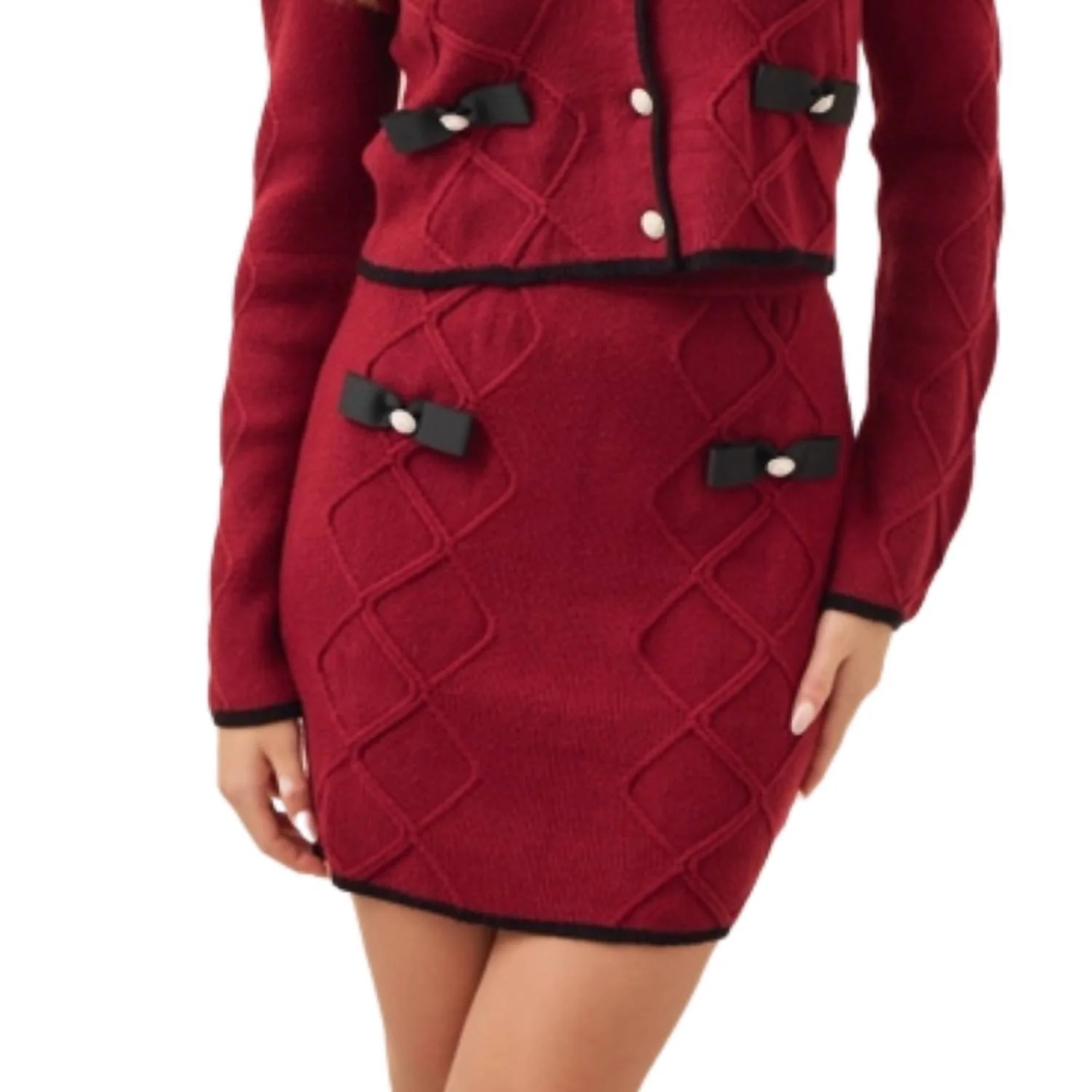 Cable Knit Mini Skirt With Contrast Bows And Pearl Flowered Buttons In Burgundy