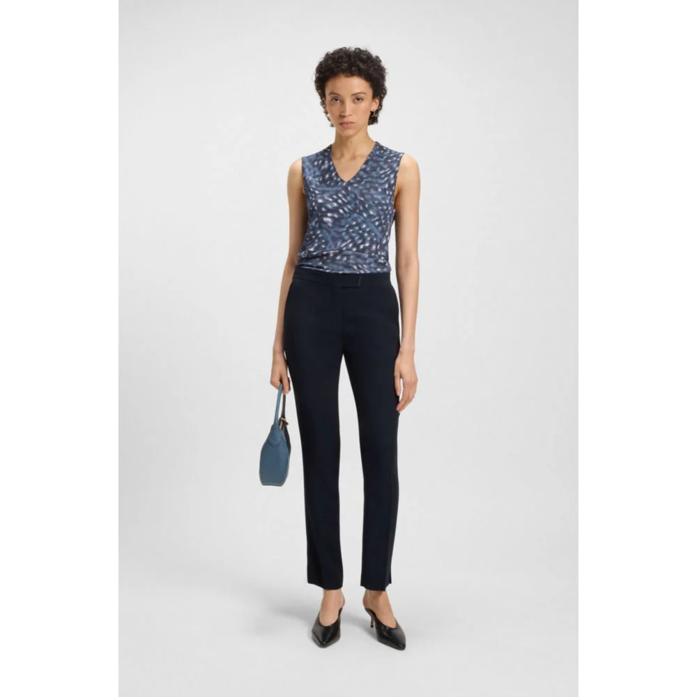 Slim-fit trousers with slit hems