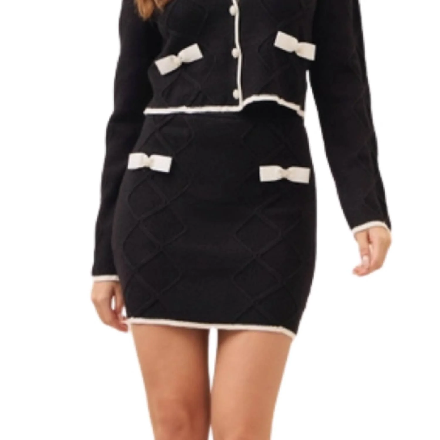 Cable Knit Mini Skirt With Contrast Bows And Pearl Flowered Buttons In Black