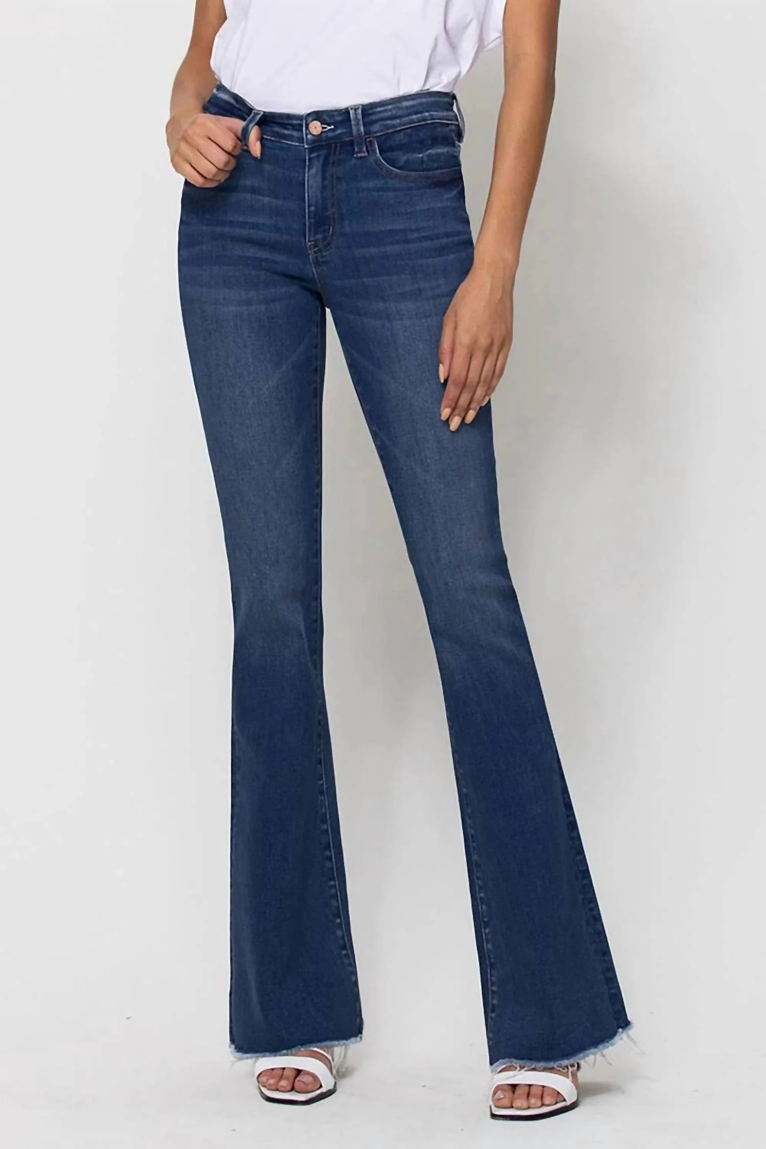 Mid Rise Raw Hem Flare Jeans In Witty