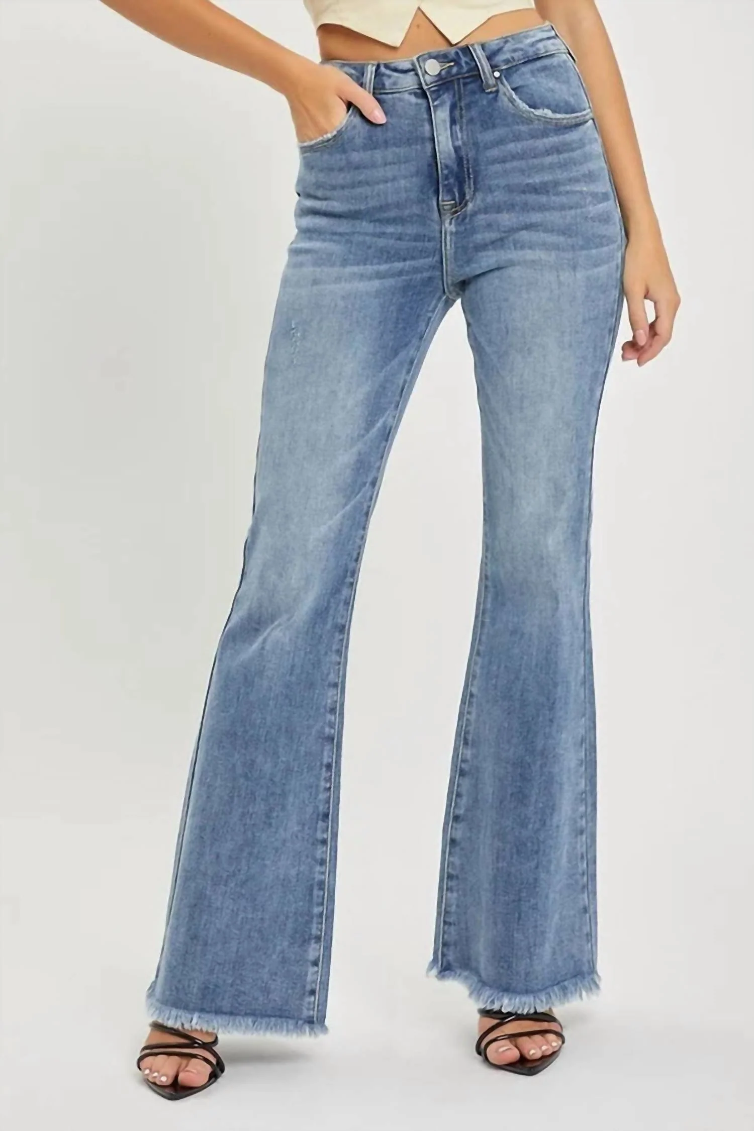 Frayed Hem Flare Jeans In Medium Wash