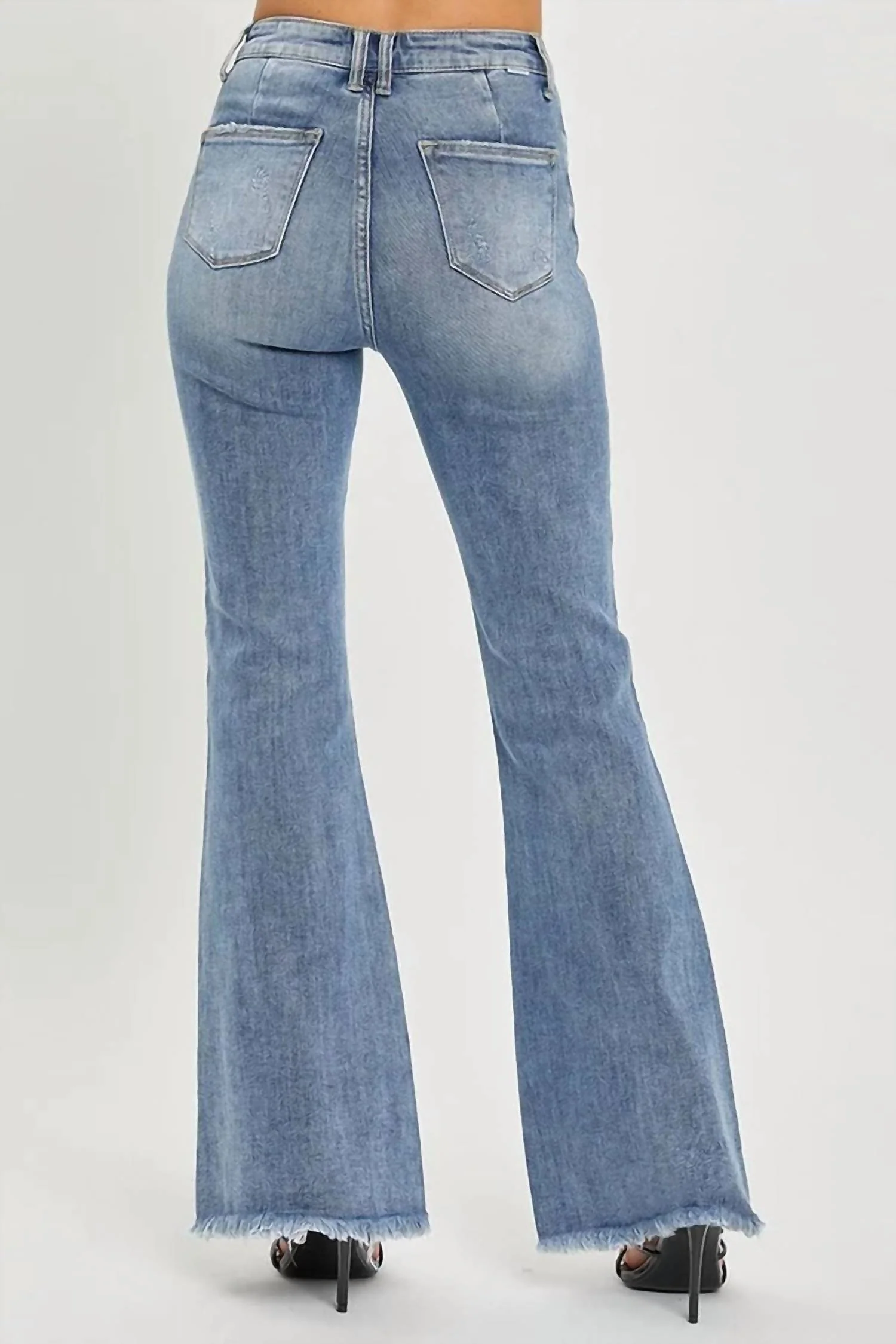 Frayed Hem Flare Jeans In Medium Wash