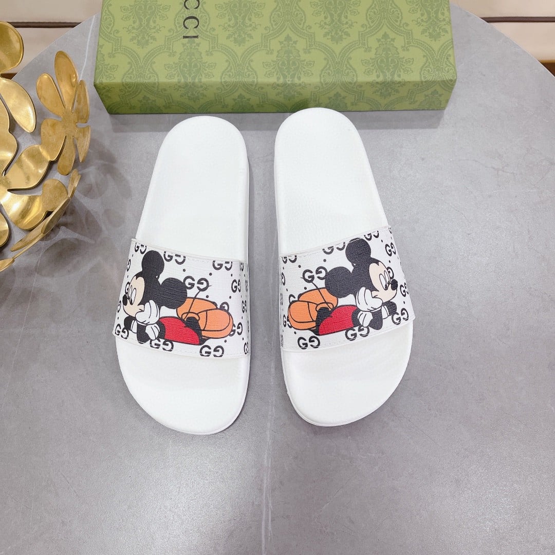 (1:1 replica) Gucci Women s GG Slide Sandal With Mickey Mouse White For Women 407345