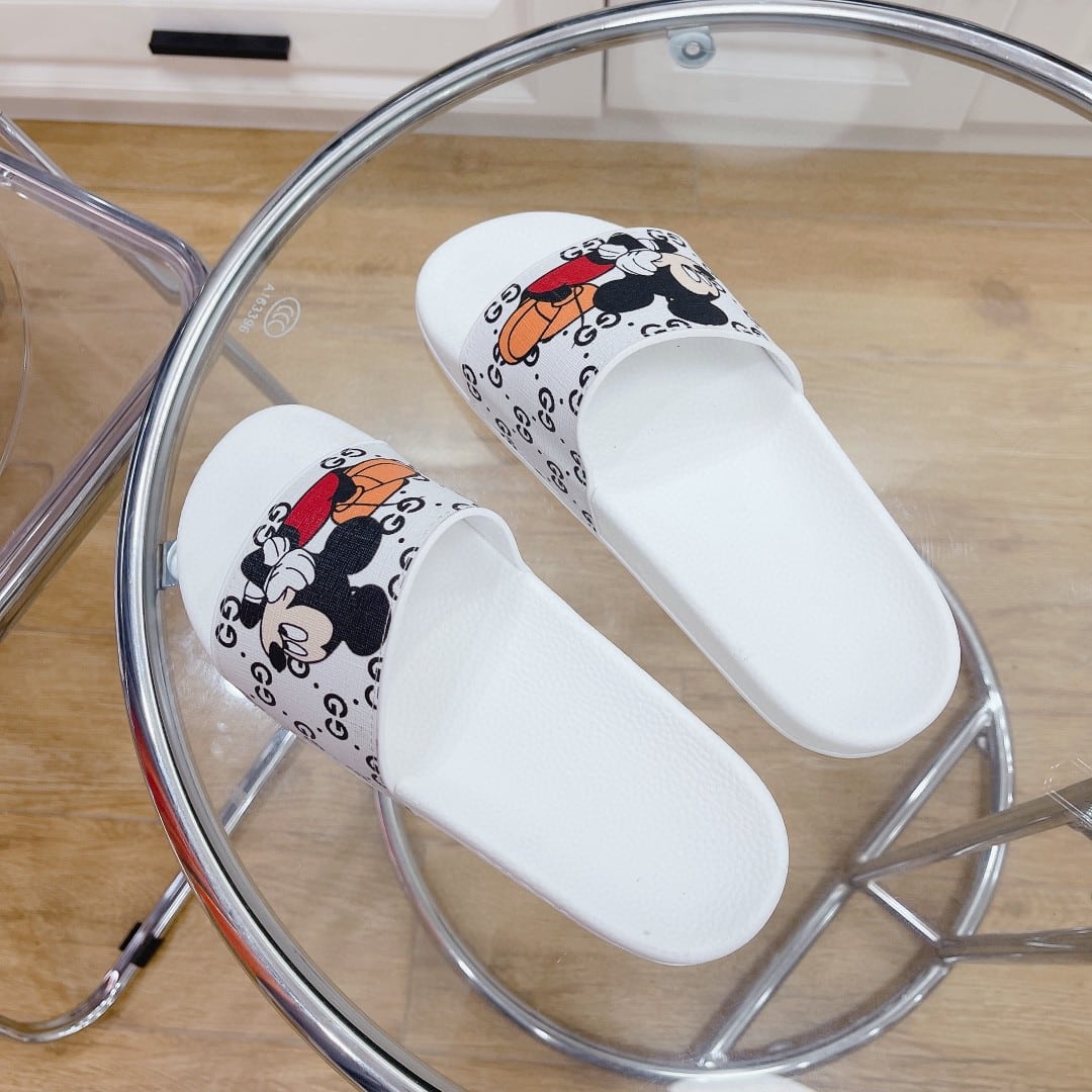 (1:1 replica) Gucci Women s GG Slide Sandal With Mickey Mouse White For Women 407345