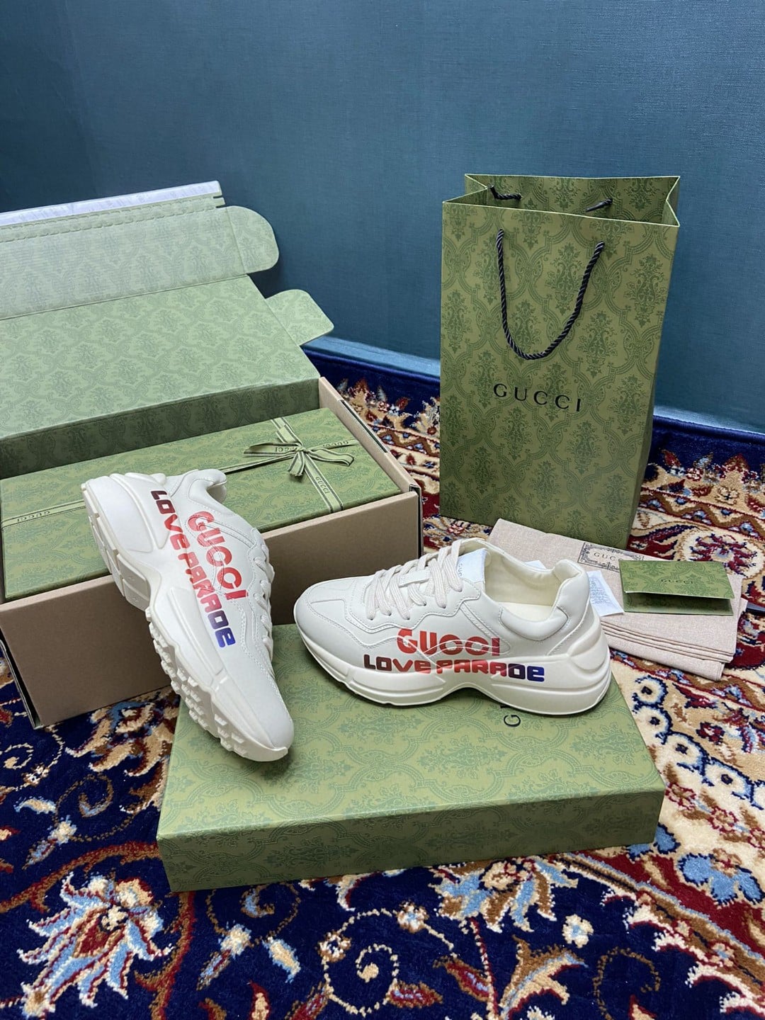 (1:1 replica) Gucci Women s Rhyton Sneakers With Gucci Love Parade Red White Ivory For Women 524990
