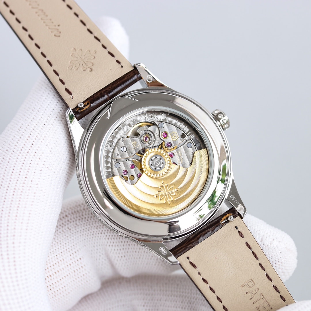 Fake Patek Philippe Replica Watch 4948G-001 Complications Ladies Annual Calendar Moon Phase 38mm Black Tahitian Mother of Pearl Arabic White Gold Diamond Set Leather(1:1 replica)