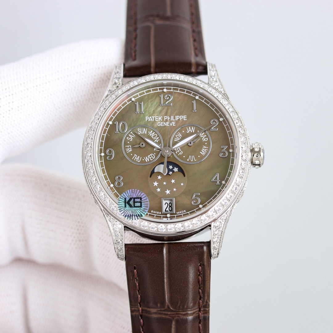 Fake Patek Philippe Replica Watch 4948G-001 Complications Ladies Annual Calendar Moon Phase 38mm Black Tahitian Mother of Pearl Arabic White Gold Diamond Set Leather(1:1 replica)