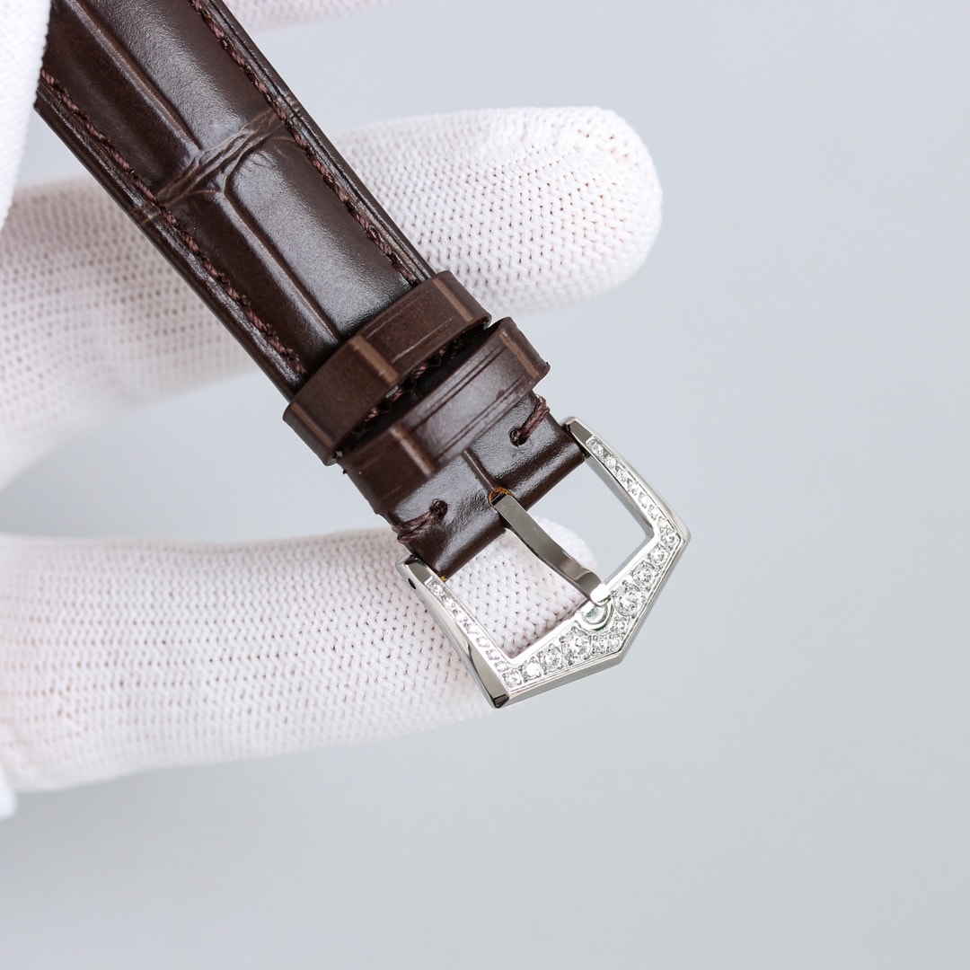 Fake Patek Philippe Replica Watch 4948G-001 Complications Ladies Annual Calendar Moon Phase 38mm Black Tahitian Mother of Pearl Arabic White Gold Diamond Set Leather(1:1 replica)