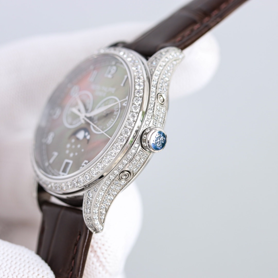 Fake Patek Philippe Replica Watch 4948G-001 Complications Ladies Annual Calendar Moon Phase 38mm Black Tahitian Mother of Pearl Arabic White Gold Diamond Set Leather(1:1 replica)