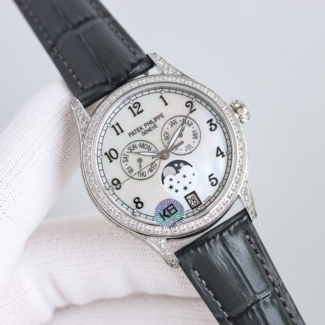 Fake Patek Philippe Replica Watch 4948G-001 Complications Ladies Annual Calendar Moon Phase 38mm Black Tahitian Mother of Pearl Arabic White Gold Diamond Set Leather(1:1 replica)