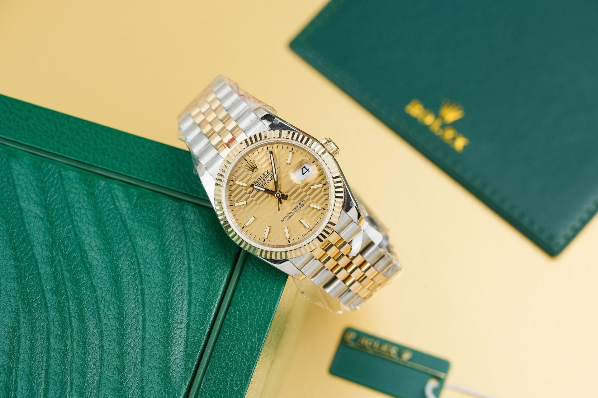 Rolex Best Replica Watch DateJust 126233 Yellow Champagne Fluted Dial Gold Wrapped 36mm