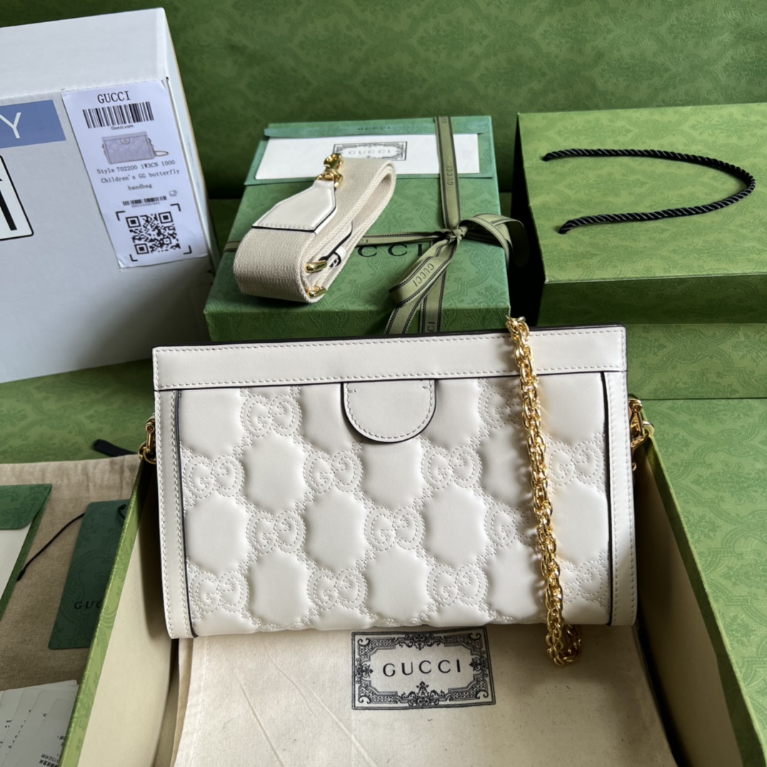 GG Matelassé leather small bag