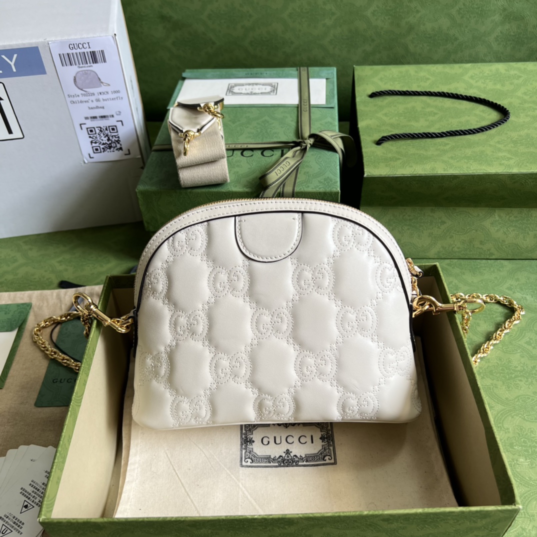 GG Matelassé leather small bag