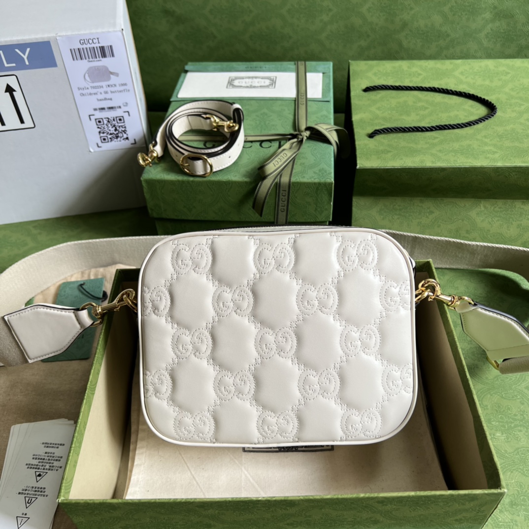 GG Matelassé leather small bag
