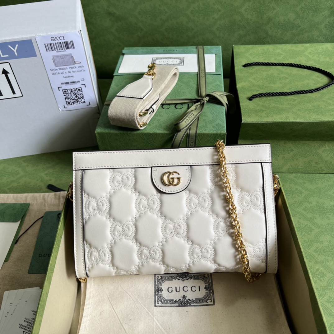 GG Matelassé leather small bag