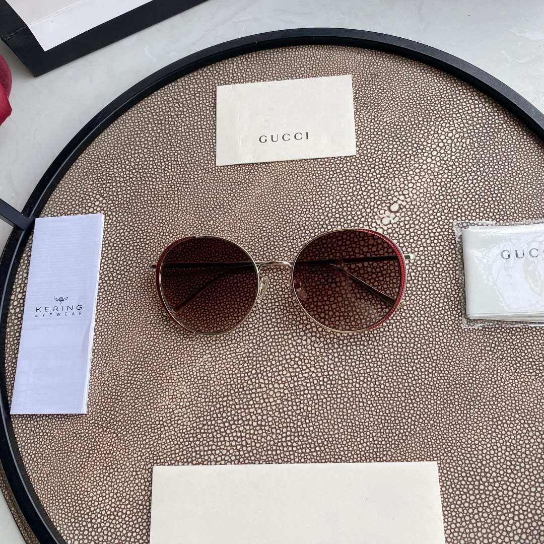 Chloé Eyewear engraved-logo round-frame sunglasses