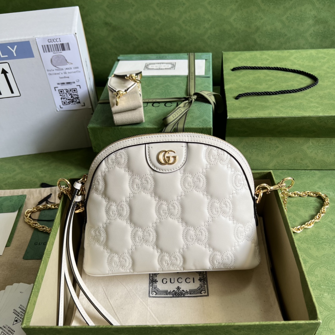 GG Matelassé leather small bag