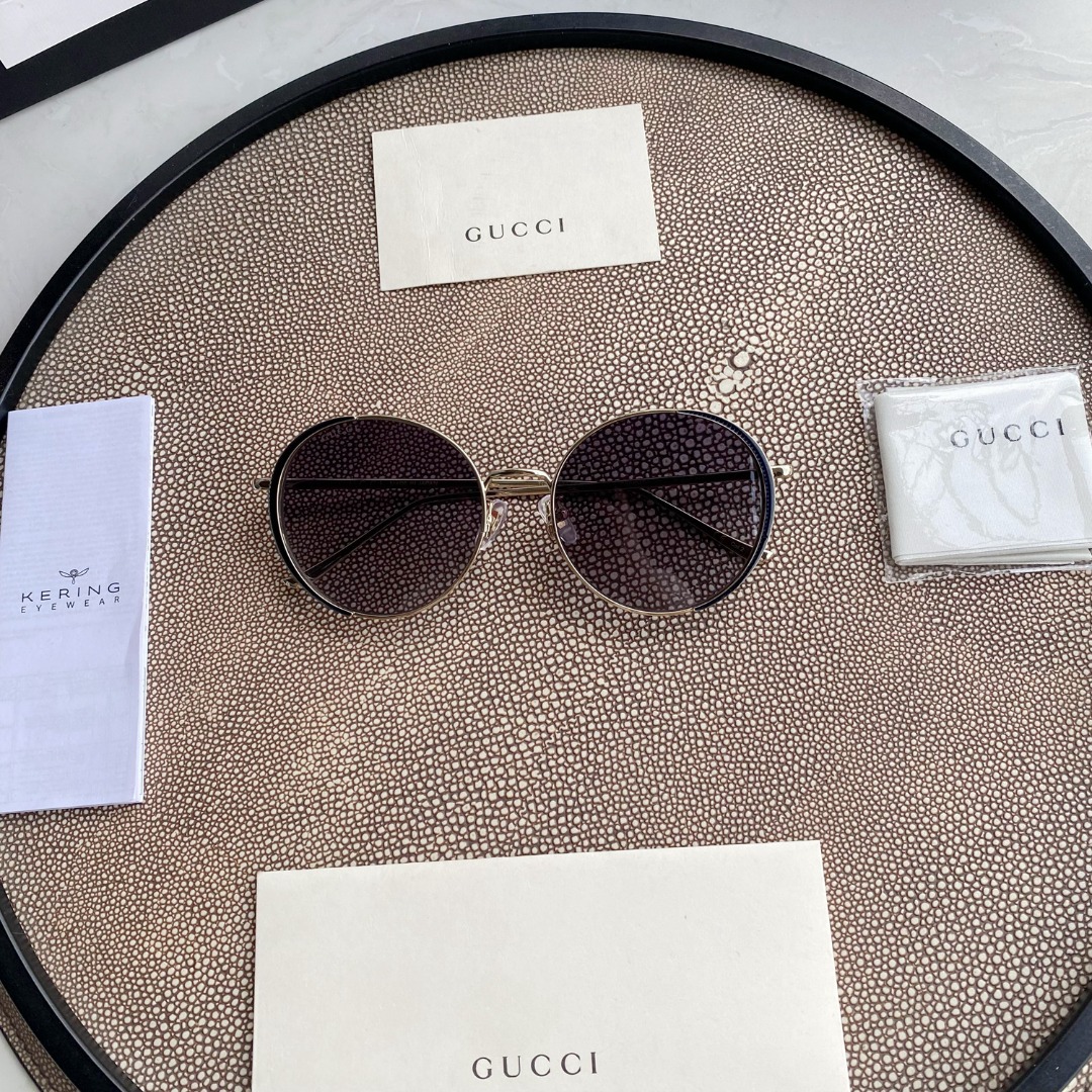 Chloé Eyewear engraved-logo round-frame sunglasses