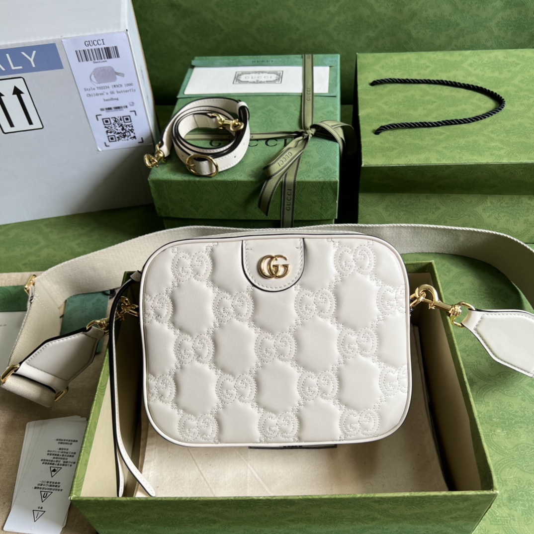 GG Matelassé leather small bag