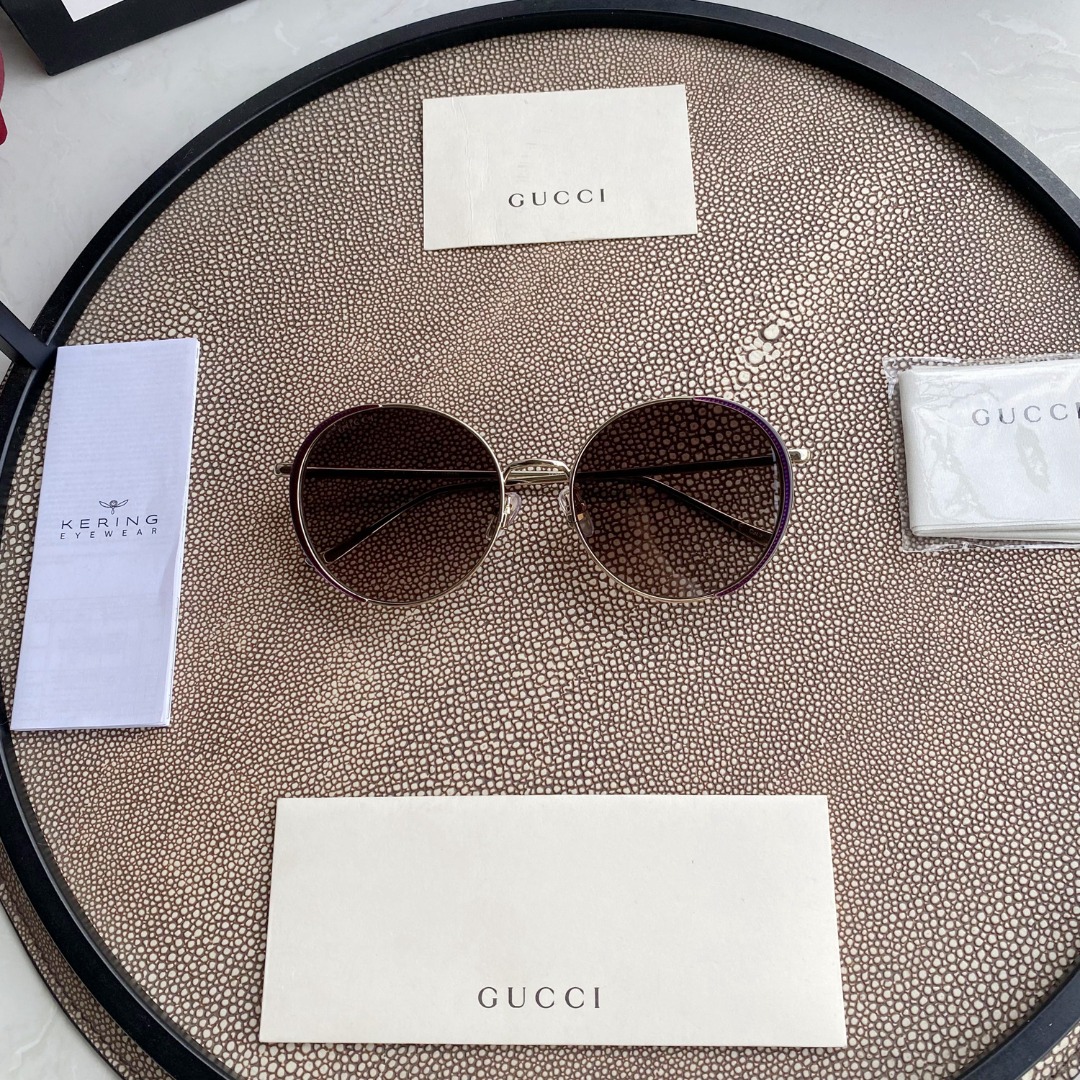 Chloé Eyewear engraved-logo round-frame sunglasses