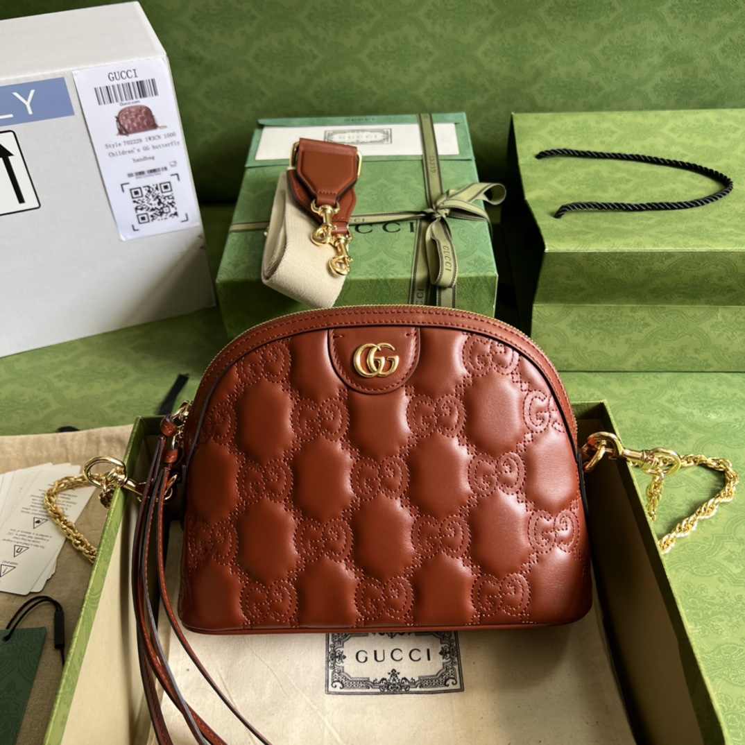 GG Matelassé leather small bag