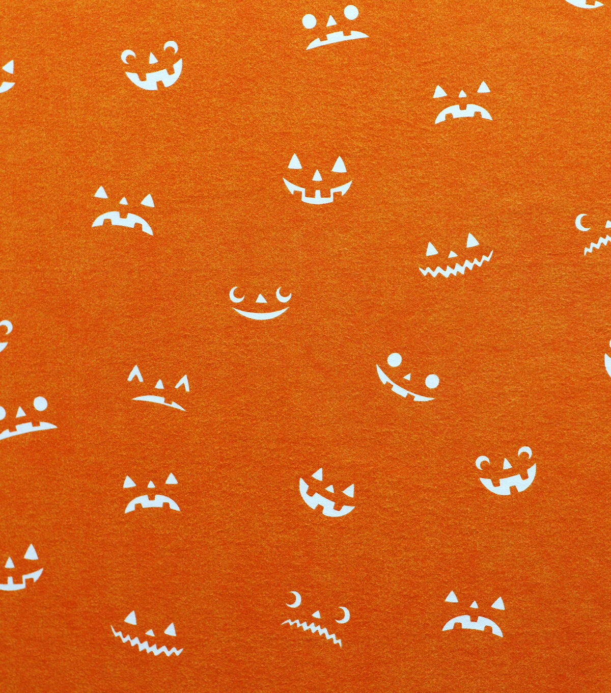 Orange Pumpkin Faces Glow in The Dark Super Snuggle Flannel Fabric