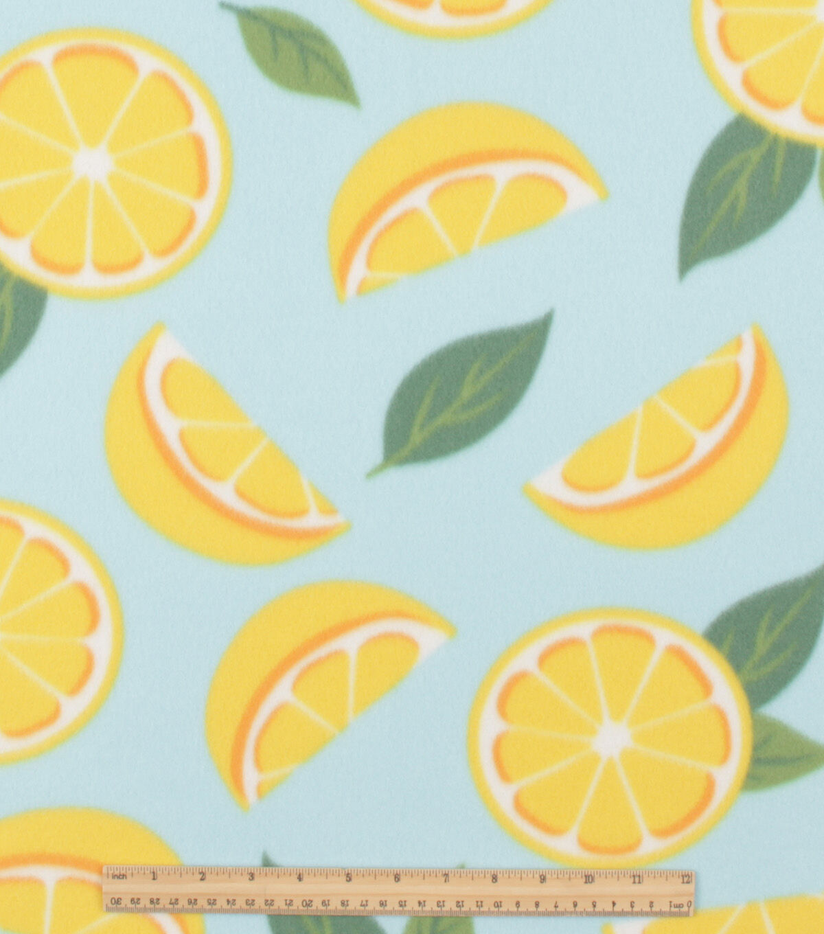 Bold Summer Lemon Slices on Blue Blizzard Fleece Fabric
