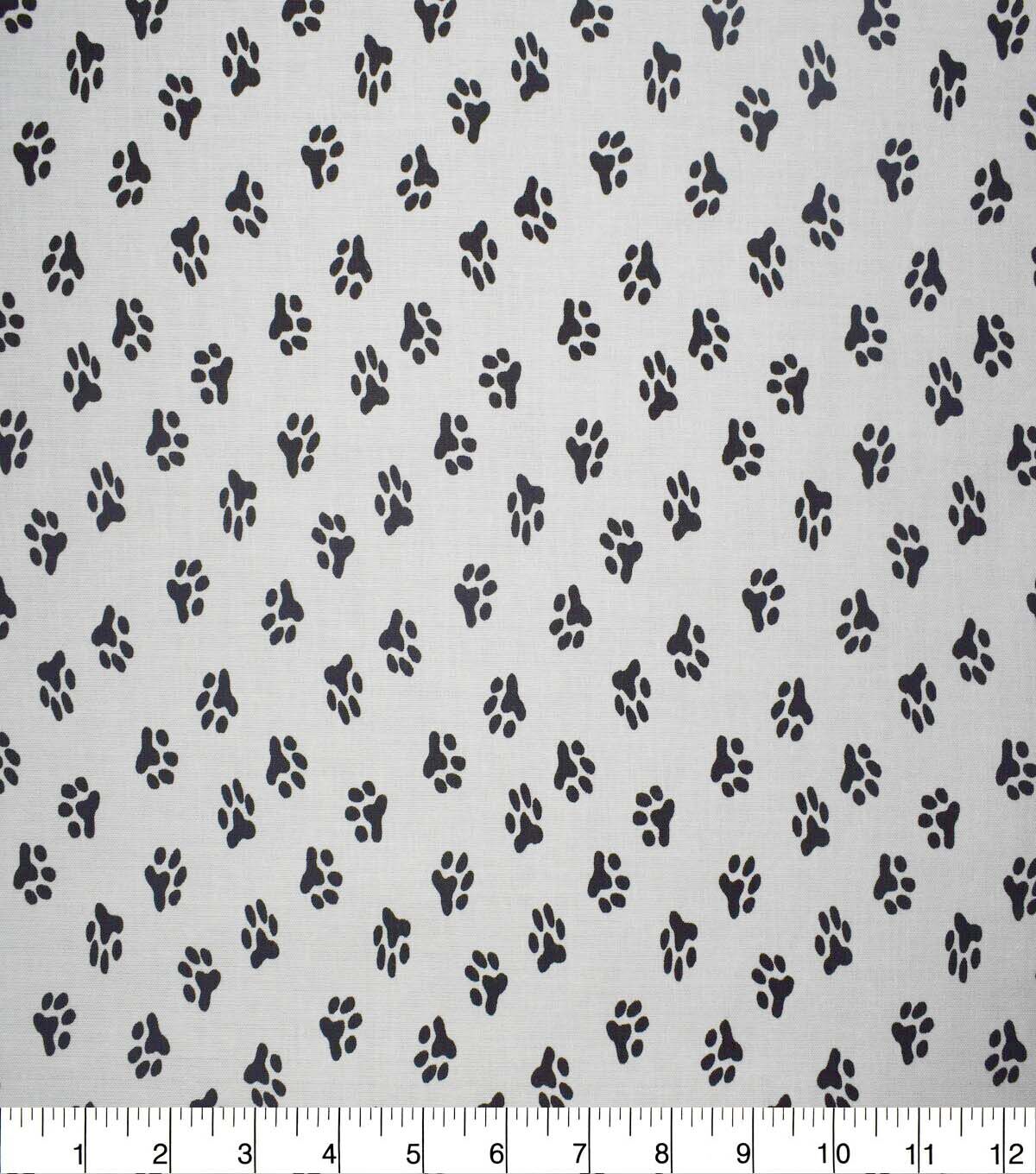 Paw Print on White Cotton Fabric by Quilter's Showcase